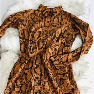 Snake print button up dress.